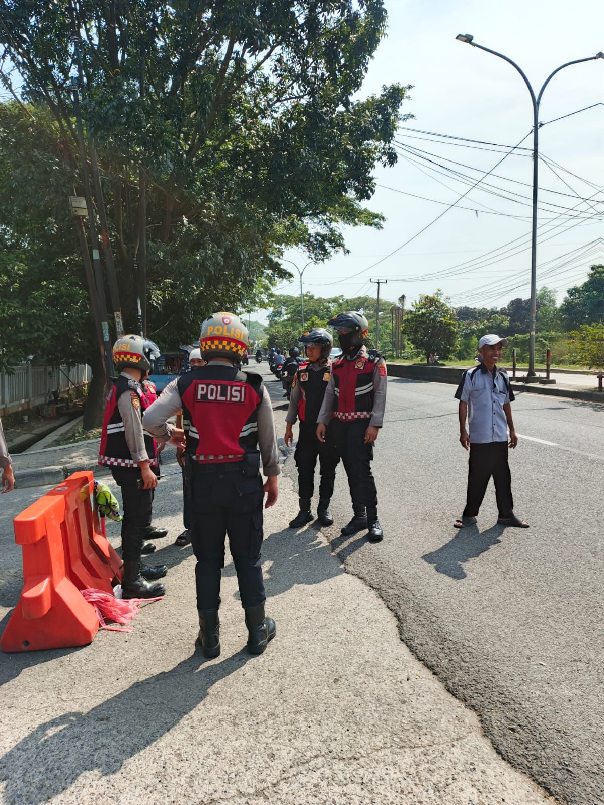 Antisipadi Penumpukan Arus Mudik Personel Sat Samapta Dikerahkan untuk Urai Lalin di Simpang Tanjungpura