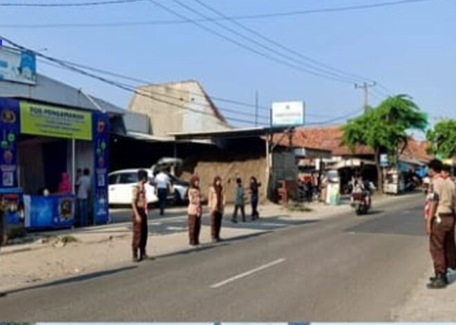 Tingkatkan Kelancaran, Personil Pos Pam Lakukan Gatur Lalin Arus Mudik