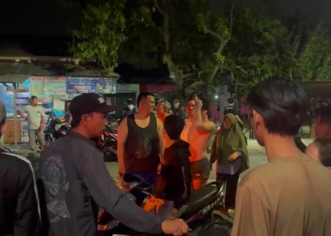 Respons Cepat Polisi dan Warga Berhasil Amankan Terduga Pelaku Dugaan Pencurian Handphone di Telukjambe Barat