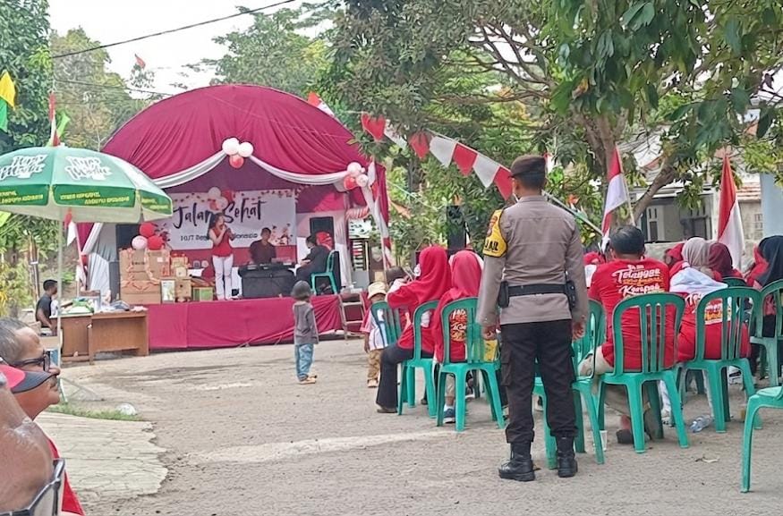 Polsek Sukadana Tingkatkan Pengamanan dan Monitoring Jalan Sehat HUT RI ke-81 di Dusun Pasirnagara